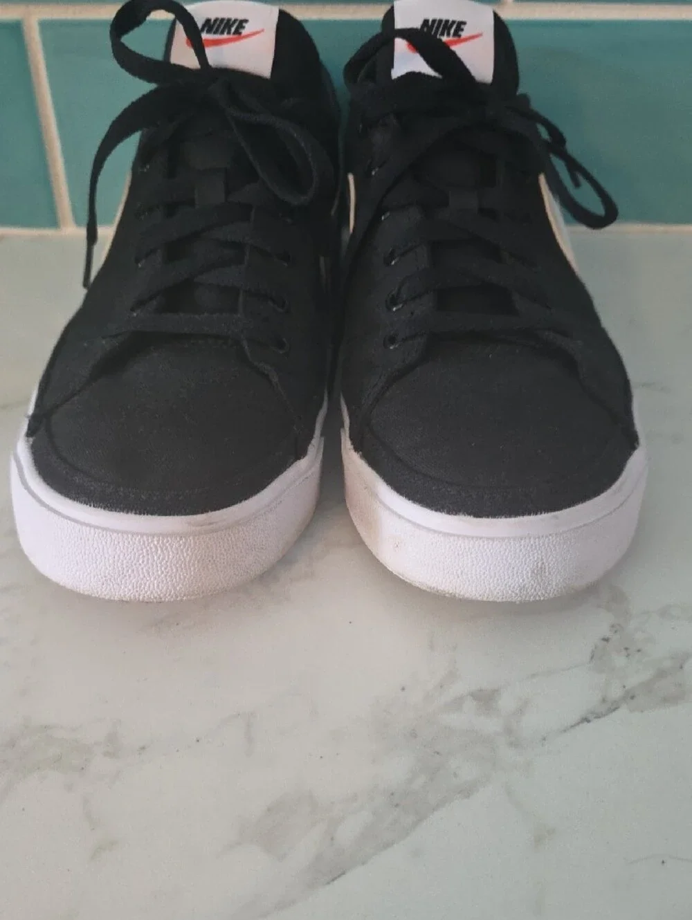 Nike Men's Black & White Low-Top Sneakers with White Swoosh